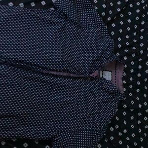 A bitten up collar shirt